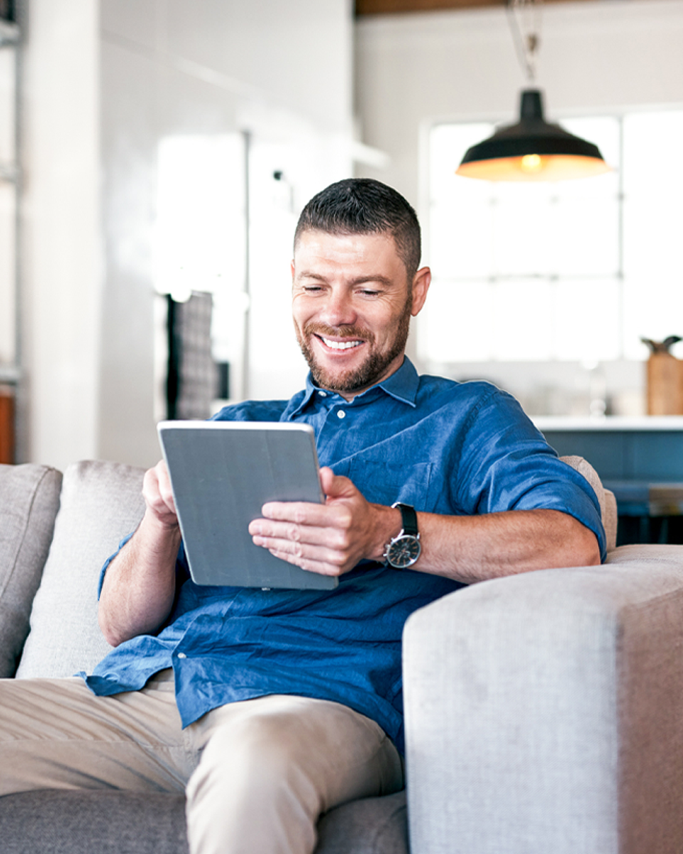 Man getting quote on ipad. 